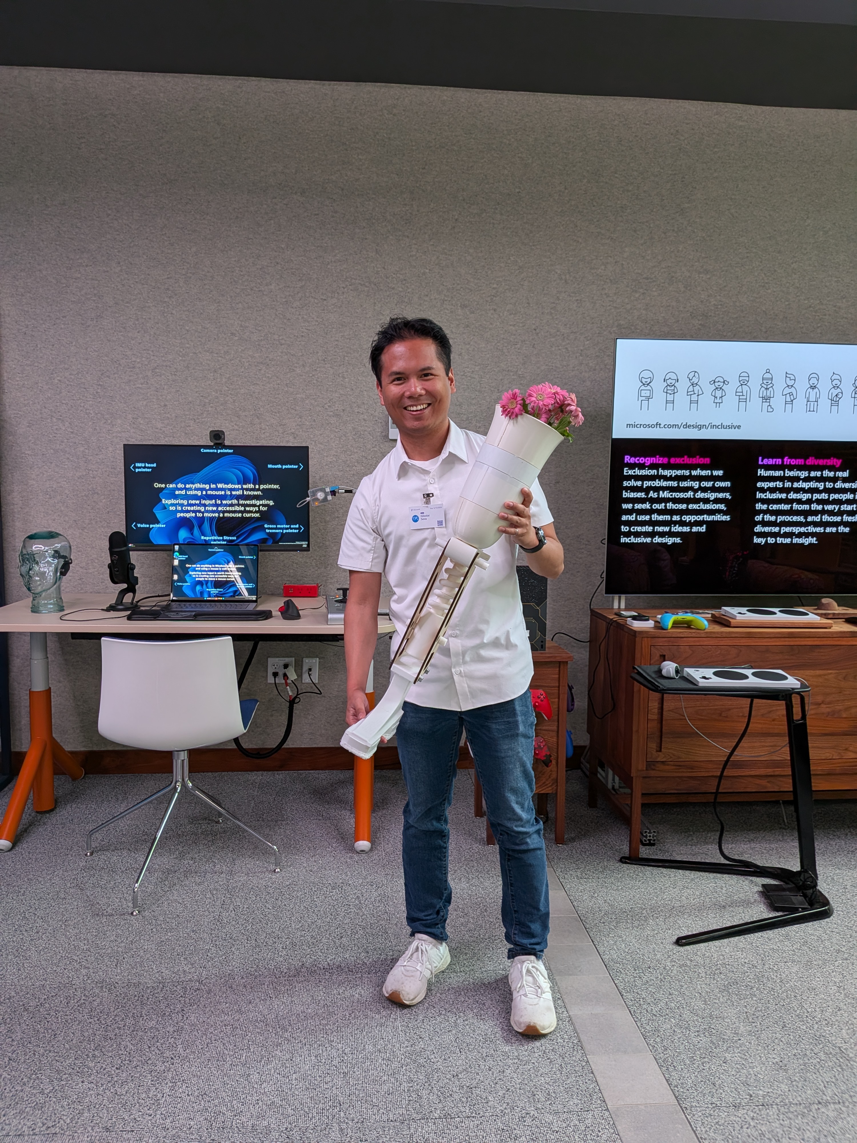 Nikolai presenting prosthetic ski leg to the Microsoft Inclusive Tech Lab team